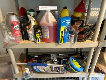 Two Shelfs Of Car Accessory Equipment Cleaners Sprays Brushes Scrapers Fluid There Will Be Something You Need