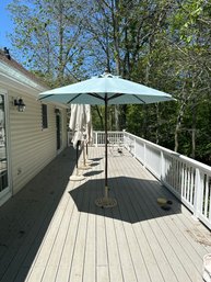 Pale Blue Fabric Umbrella With Stand Opens And Closes With Ease