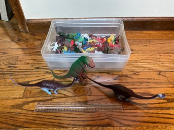 Bin Toy Lot Filled With Assorted Toy Dinosaurs And Accessories