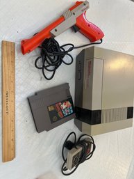 Nintendo Entertainment System With Gun Controller And Mario Brothers Cartridge