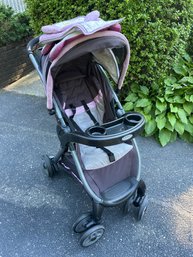 Pink And Grey Graco Fast Action Fold Stroller Good Condition. Scratched Up On The Plastic