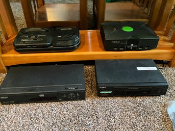 Lot Of Vintage Electronics, DVD Player, VHS Player Xbox And Sega Genesis Plus Assorted Wires