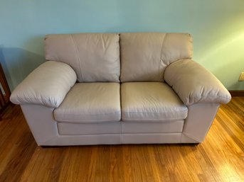 64 Inch Beige Faux Leather Loveseat In Great Condition 36 Inches High 36 Inches High, 36 Inches Deep