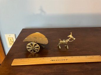 A Gold Tone Product Donkey Pulling Cart