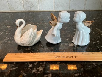 Lot Of Ivory And Gold Figurines Kissing Angels And Swan