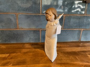 Lladro Curious Angel Figurine Holding Lantern