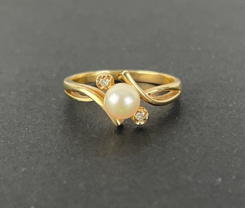 10k Gold Ring With Pearl And Clear Stone