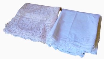 2 Table Clothes. 1 Quaker Lace 60' X 80' 1 White Cotton With Lace 100' X 60'