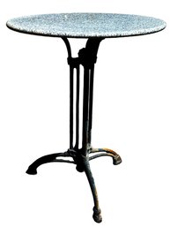Granite Top Outdoor Table With Cast Iron Legs. Visible Stains