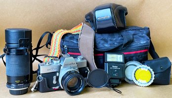 Minolta SR T 101 Camera With Case, Traveling Bag , External Flash, Large 70-210MM Lens With Case