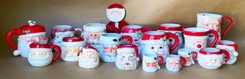 Santa Themed Mug Collection And Santa Candle Holders