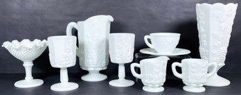 Assorted Milk Glass With Grape Motif Including Pitcher, Goblets, Vase, Cream/sugar, & More