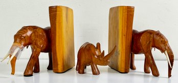 Carved Wooden Elephant Bookends With Rhinoceros Figurine