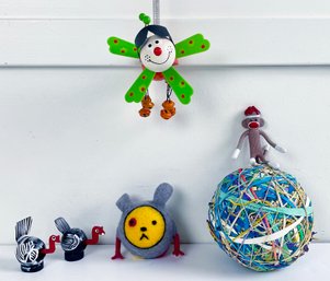 Assorted Kitsch Set Including Pin Cushion, Rubber Band Ball, Bobble Head Pair, And More