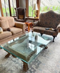 Glass And Carved Wood Coffee Table