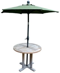 Gloster Teak Patio Table With Green Umbrella