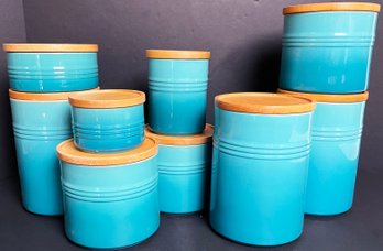 Large Collection Of Le Creuset Canisters With Wood Lids