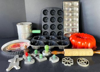 Vintage Bakeware Including Bundt Pans, Cookie Cutters, And More
