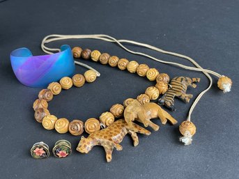 Eclectic Jewelry Lot Including Carved Wood Necklace, 80's Irridescent Cuff Bracelet, & Enamel Earrings