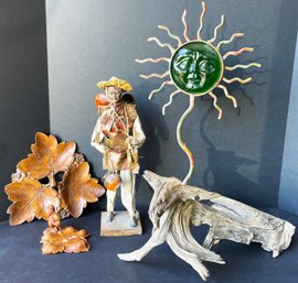 Assorted Decor Including Carved Wood Nut Dish, Drift Wood, Paper Mache Figure, & Sun Candleholder