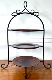 3 Hammered Copper Charger Plates On A Tiered Wrought Iron Stand