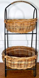 2 Woven Wicker Baskets On A Tiered Metal Stand