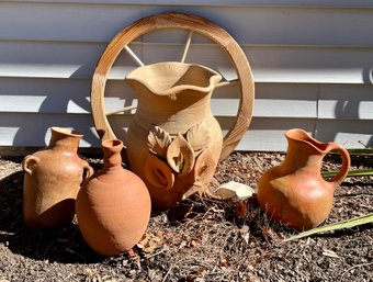 Clay Vases, Pot, And Wood Wheel