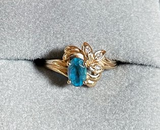 14k Gold Ring With Blue Stone And Tiny Diamonds