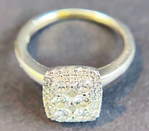 14 Carat White Gold Ring With What Appear To Be Diamonds