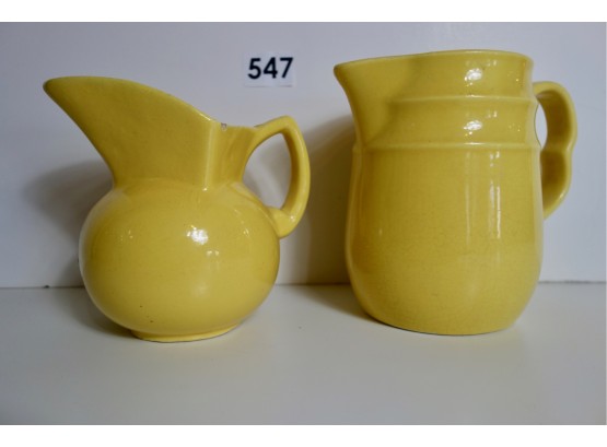 2 Antique Yellow Pitchers, One Is Niloak