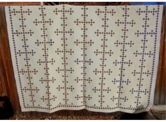 Antique Quilt With Purple Cross Pattern