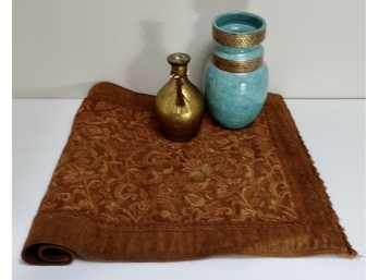 2 Vases With An Area Rug