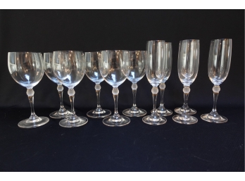What Appear To Be Crystal Wine Glasses And Champagne Flutes