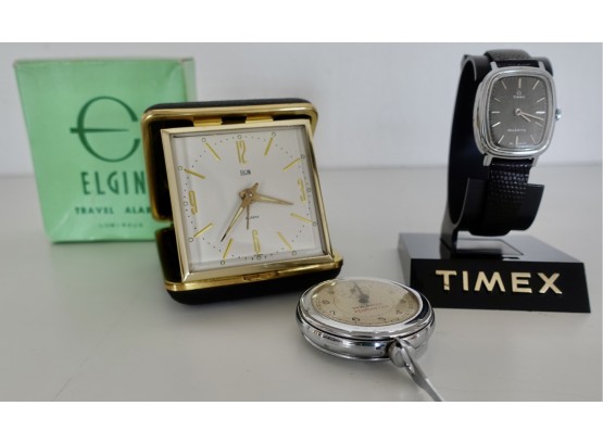 Vintage Elgin Travel Clock, New Haven Pedometer, And Timex Quartz Watch.