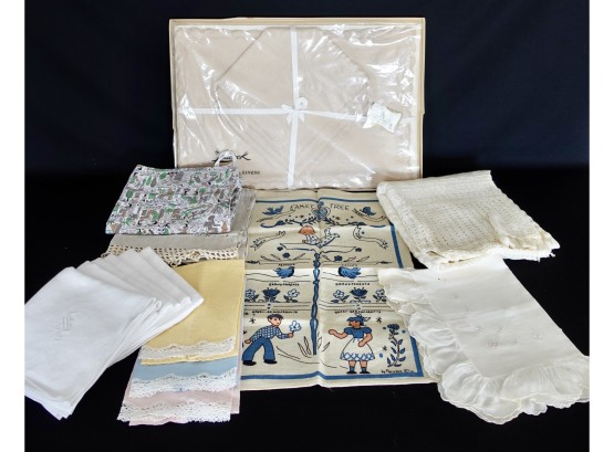 All Sorts Of Vintage Linens Including New Old Stock Placemats And Napkins, Grain Sack, Crocheted Blanket.