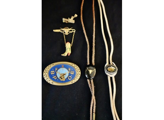 Men's Accessories Including 2 Bolo Ties, 2 Tie Clips, & A Brass Belt Buckle