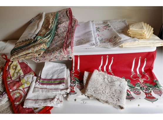 Assorted Vintage Linens Including Doilies, Embroidery, & Vintage Christmas Tablecloth