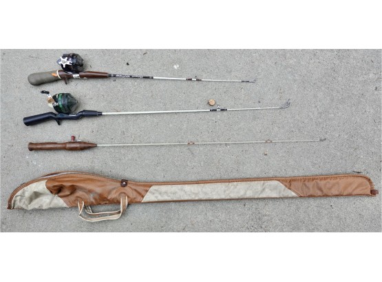 Three Sport Fishing Rods And A Rod Carrier