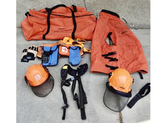 Stihl Bag With Logging Equipment Including Helmets, Gloves, Tool Belt, And Protective Chaps
