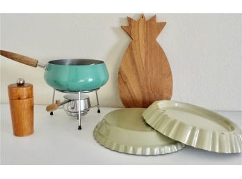 Mid Century Kitchen Items Including Pie Tins, Pineapple Cutting Board, Fondue Pot, & Grinder