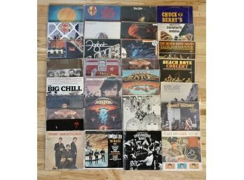 30 LP Vinyl Records Including The Beatles, Boston, Aerosmith, Beach Boys, Elvis, & More