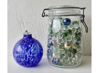 Large Jar Full Of Marbles And Glass Oil Lamp