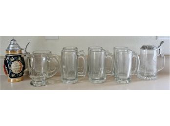 Glass Mugs And A Stein