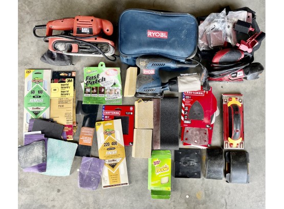 Ryobi, Skill, And Black And Decker Sanders, Sand Paper, And More In Bin
