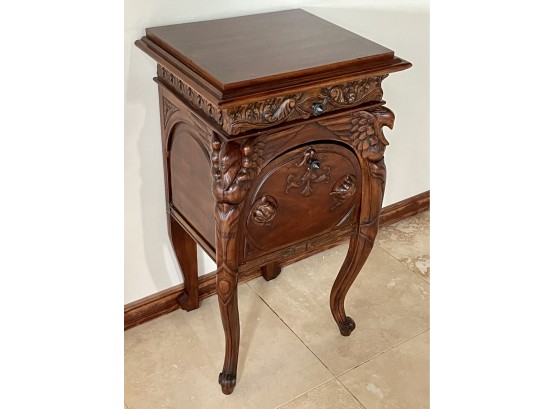 Fun Carved Side Table With Drawer, Drop Front Cabinet, And Eagle Head Motif