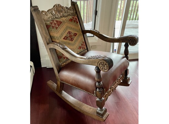 Large Carved Wooden Rocker With Fabric  Back And Leather Seat
