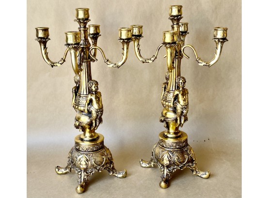 2 Gold Toned Candelabras With Cherub Motif