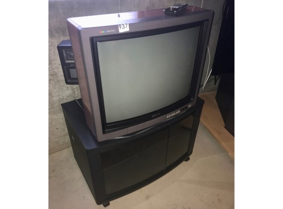Sony Trinitron 25' TV W/Stereo Speakers, Remote, Manual, & Rolling TV Stand