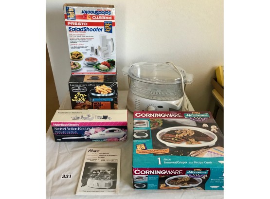 Various Kitchen Appliances Including Fryer, Steamer, & Electric Knife