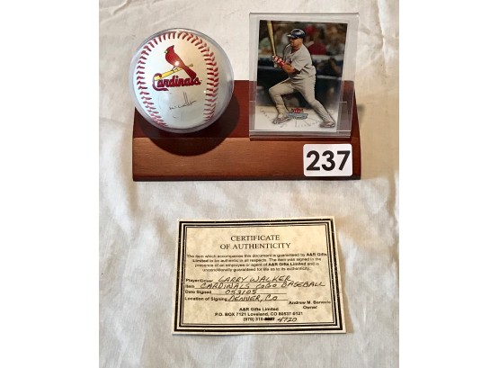Larry Walker Autographed Baseball On Stand W/Baseball Card & Certificate Of Authenticity
